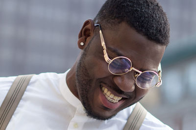 Portrait of young man wearing sunglasses