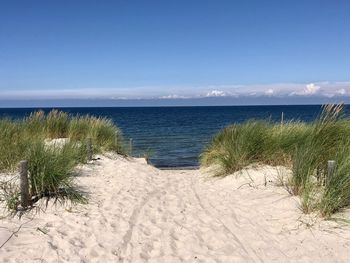 Scenic view of beach against sky