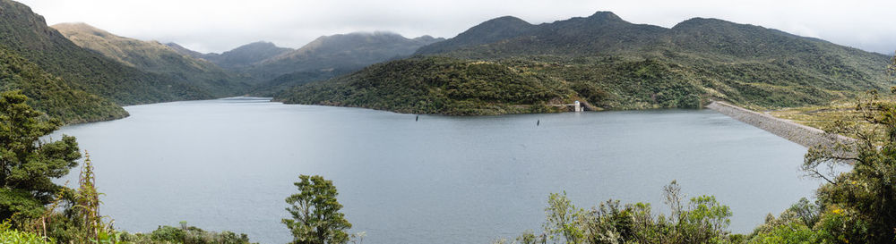Panoramic view of lake and mountains against sky