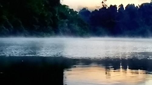 Close-up of water splashing against sky