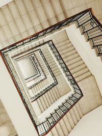 Directly below shot of spiral staircase in building