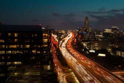 High angle view of light trails on city street