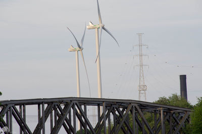Low angle view of windmill against clear sky