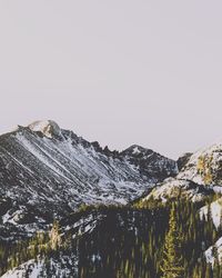 Scenic view of snowcapped mountains against clear sky