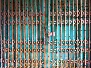 Full frame shot of rusty metallic gate