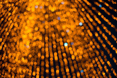 Defocused image of illuminated lights at night