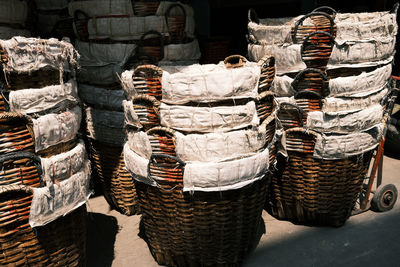 Stack of firewood for sale at market