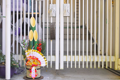 Multi colored flower pots on building wall