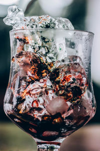 Close-up of ice cream on glass table