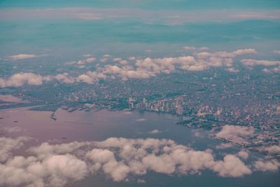 High angle view of cloudscape over city