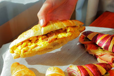 Close-up of person holding food