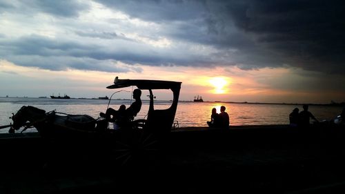 Scenic view of sea at sunset