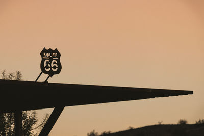 Low angle view of silhouette tree against sky during sunset