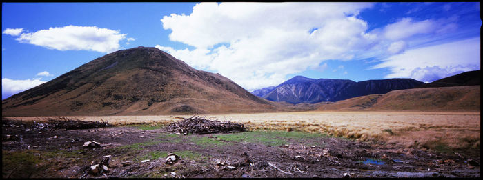 Panoramic view of landscape and mountains against sky