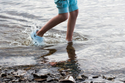 Low section of person on beach