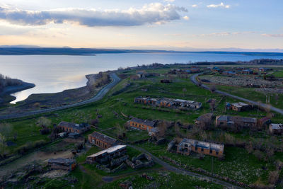 High angle view of buildings against sky during sunset