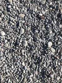 High angle view of stones on pebbles