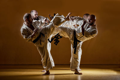 People practicing martial arts