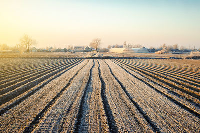 Preparing farm field for spring work and planting season. choosing right time for sow fields plant