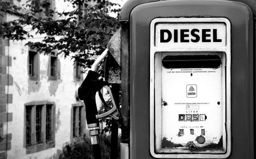 Information sign on old telephone booth