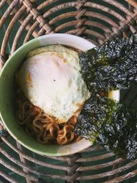 High angle view of ice cream in basket on table