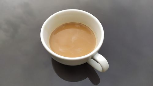 High angle view of coffee cup on table