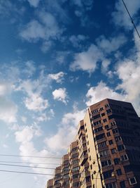 Low angle view of modern building against sky