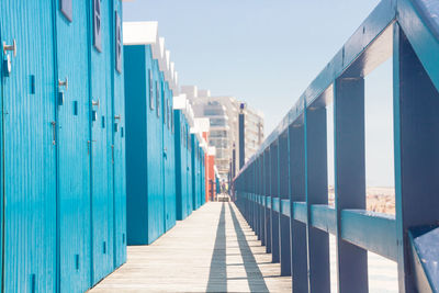 Blue beach huts by the sea