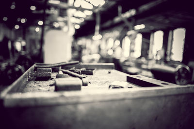 Close-up of old machine on table