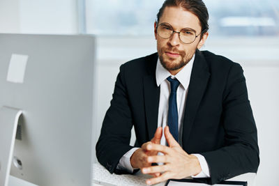 Portrait of businessman at office