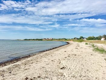 Scenic view of beach against sky