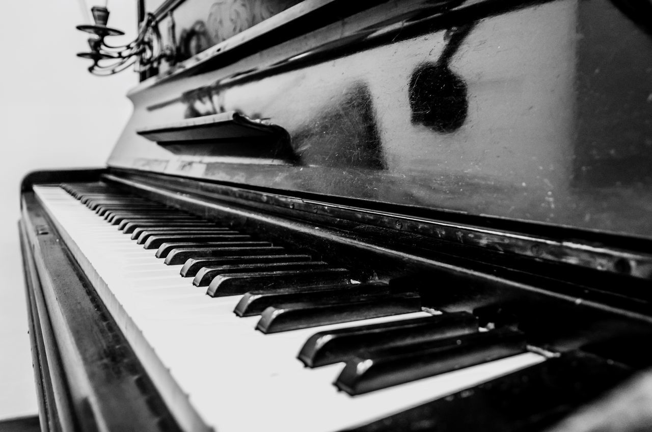 CLOSE-UP OF PIANO KEYS IN NIGHTCLUB