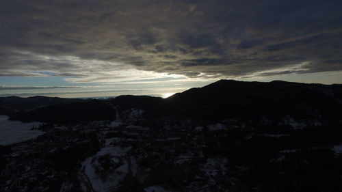 Scenic view of mountains against sky during sunset