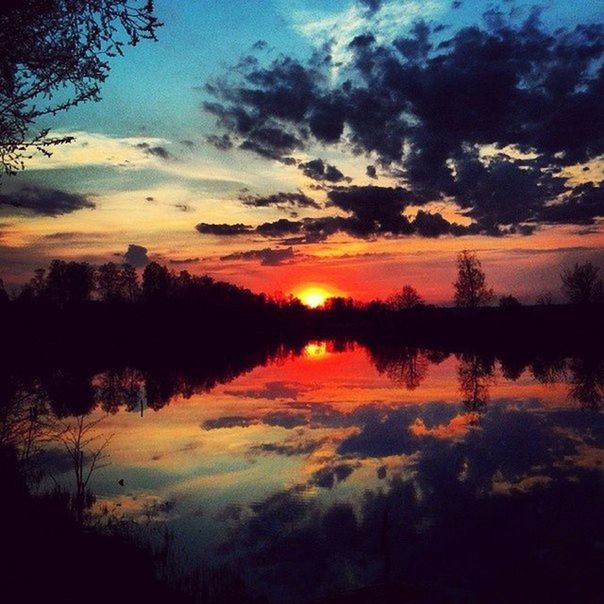 SCENIC VIEW OF SUNSET OVER LAKE