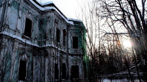 Low angle view of old building against sky