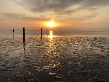 Scenic view of sea against sky during sunset