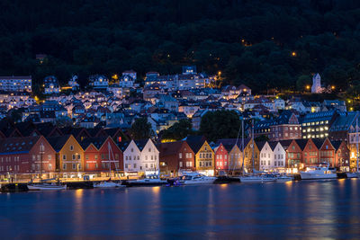 Illuminated buildings in city at night