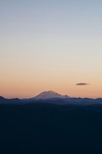 Scenic view of silhouette mountains against clear sky