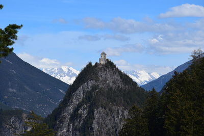 View of mountain range against cloudy sky