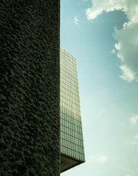 Low angle view of modern building against sky