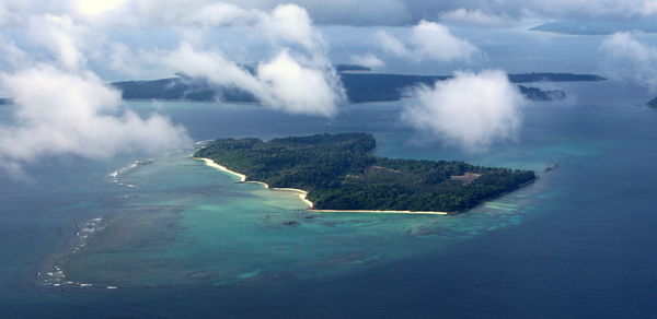 Aerial view of bay against sky