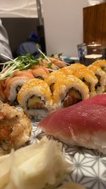 Close-up of sushi served on table