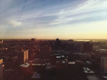 High angle view of buildings against sky during sunset