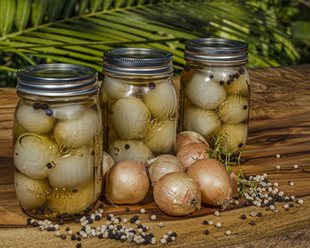 Close-up of eggs in jar on table