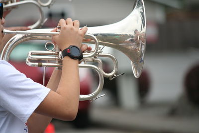 Person playing cornet on fourth of july independence day parade