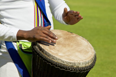 Hands of a man playing drum