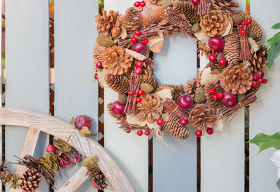 Close-up of stuffed toy hanging on wood
