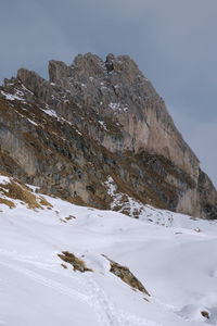 Scenic view of snowcapped mountains against sky. winter hike around seceda, south tyrol, italy