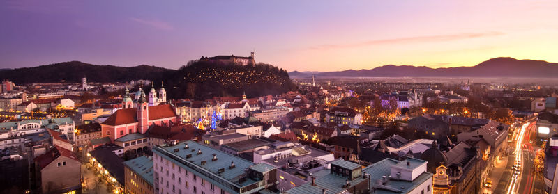 High angle shot of townscape against sky during sunset