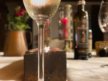 Close-up of wineglass on table